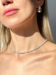 Stunningly elegant and crafted with precision, this tennis necklace of solid 14k gold or Sterling silver 925 features rows of dazzling moissanite diamonds for a luxurious, timeless look. With a total carat weight ranging from 13.75-78.00, this necklace is perfect for any special occasion or everyday wear. This exquisite necklace has high polished rhodium finish that gives it a stunning shiny look that lasts for many years. Every item, is shipped in gorgeous gift box so it could make a perfect gi Wedding Tennis Necklace, Moissanite Tennis Necklace, Tennis Diamond Necklace, Glitz And Glamour Party, Long Diamond Necklace, Silver Prom Jewelry, Glamour Party, Chain For Women, Prom Jewelry