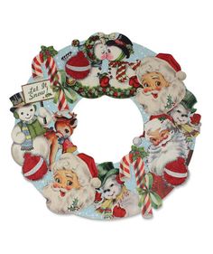 a christmas wreath with santa claus and other holiday decorations