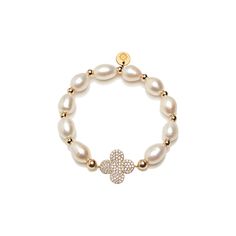 Our 14K Gold Freshwater Pearl beaded bracelet is a must have. Gold Freshwater Pearls are classic staples for your everyday use. All of our bracelet are made with quality plated metals and will last with care. Please note: These items have been tested throughout various conditions and are made to last. The less contact with harsh materials, the longer the wear. Please note that salt water, chlorine and alcohols from perfumes and creams can damage the finish. Elegant Hand-strung Charm Bracelet, Pearl Beaded Bracelet, Custom Bracelet, Freshwater Pearl Bracelet, Bracelet Beaded, Custom Bracelets, Hair Piece, Adjustable Bracelet, Gold Beads