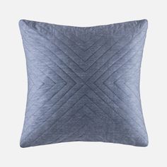 a blue pillow on a white background