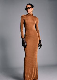 Long sleeve, high neck maxi dress. Shown here in Camel. 94% Polyester, 6% Spandex Made in China Model is 5'10" wearing size S Style No. 4467-17 2024 Wardrobe, Fall Wardrobe Staples, Summer Neutrals, High Neck Maxi Dress, Knit Outerwear, Romper And Jacket, Knit Shoes, Summer Capsule Wardrobe, Knit Denim