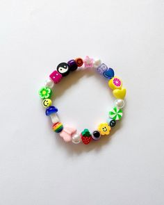 Playful Adjustable Multicolor Charm Bracelet, Trendy Adjustable Multicolor Beads, Fun Handmade Adjustable Beads, Multicolor 8mm Beaded Wristband, Casual Multicolor Beaded Wristband, Playful Adjustable Beaded Bracelets With Colorful Beads, Adjustable Colorful Beaded Playful Bracelets, Novelty Multicolor Wristband With Letter Beads, Adjustable Multicolor Novelty Friendship Bracelets