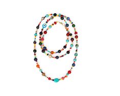 Multi color beaded long gemstone necklace. Made of rainbow colored glass seed beads and multi colored natural stones including turquoise, jade, dalmatian jasper, coral, onyx and agate gemstones. The necklace measures 36 inches in length and finished with a gold plated lobster claw clasp.  Details: - Multi-colored gemstones - Czech glass beads - Gold plated lobster claw clasp For additional information, please feel free to contact us. Colorful Faceted Beads Jewelry For Festivals, Colorful Bohemian Faceted Beads, Gemstone Beads Long Necklace Gift, Colorful Bohemian Jewelry With Gemstone Beads, Long Gemstone Beads Necklace As Gift, Long Necklace With Round Gemstone Beads For Gift, Gift Long Necklace With Round Gemstone Beads, Colorful Bohemian Necklaces With Faceted Beads, Bohemian Multicolor Round Beads Long Necklace