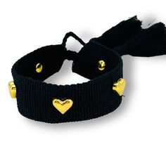 This adorable Hearts Bracelet is perfect to wear alone or combined with other bracelets. This is an adjustable bracelet so it is ideal for all ages and wrist sizes. - Gold Plated Heart Charm - Cotton - Adjustable For All Sizes Listing is for 1 Hearts Bracelet only. Adjustable Black Friendship Bracelets For Valentine's Day, Adjustable Beaded Bracelets With Heart Beads For Friendship, Adjustable Black Bracelets For Valentine's Day, Trendy Adjustable Heart Bracelet, Adjustable Sliding Knot Friendship Bangle, Adjustable Wristband For Friendship, Adjustable Charm Bracelet With Heart Beads, Adjustable Friendship Bracelets With Heart Charm, Cute Adjustable Gold Charm Bracelet