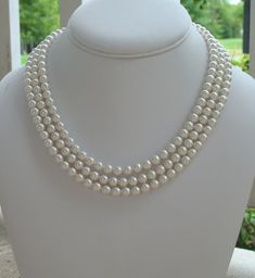 "Chunky Pearl Necklace ~ This elegant triple strand pearl necklace makes the perfect bridal jewelry, gifts for bridesmaids, or mother of the bride jewelry! It is lovely accent for your everyday wardrobe as well. Made with a smaller 6mm Swarovski pearl, it adds such class to any day; whether you are a bride walking down the aisle in her bridal jewelry, or a woman getting ready for a day at the office. This necklace measures 16\" along the shortest strand with a 3 strand filigree box tab clasp. Pl Woman Getting Ready, Bride Walking Down The Aisle, Mother Of The Bride Jewelry, Graduated Pearl Necklace, Pearl Necklace Bridal, Ivory Pearl Necklace, Chunky Pearl Necklace, Gifts For Bridesmaids, Black Crystal Earrings