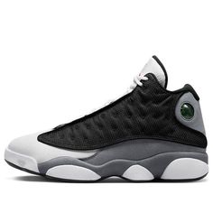 The Air Jordan 13 Retro 'Black Flint' is a sleek and stylish sneaker with a minimalist color palette. The Jordan branding on the upper is detailed and adds to the shoe's charm. The toe is designed to protect against scuffs and collisions, making it perfect for any activity. Inspired by the iconic Black Cat, this sneaker is part of a series of shoes that are sure to turn heads. The combination of black, university red, flint grey and white make this shoe a timeless classic. Whether you're on the court or out and about, the Air Jordan 13 Retro 'Black Flint' is the perfect choice. (SNKR/Panda/Basketball) Retro 13 Black Cat, Gray And White Jordans, Jordan 13 Black Flint, Minimalist Color Palette, Jordan 13 Black, Air Jordan Retro 13, Jordan 13 Shoes, Retro 13, Minimalist Color