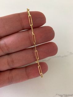 "14K Solid Gold Paperclip Bracelet, Triangle Diamond Cut Solid Gold, Gift For Her, 7.5\" long 3MM Wide, Real Gold Bracelet, Lightweight, Women Great bracelet for every day wear. It is lightweight and 14K solid gold ♦ Materials: 14K Solid Gold  ♦ Available color: Gold ♦ Measurements: 7.5\" long, 3MM wide, Diamond Cut Triangle Links MATERIALS All chains and pendants are made 14K Gold  HOW TO FIND YOUR PERFECT FIT Neck size is probably the most important measurement for determining which necklace l Real Gold Bracelet, Paperclip Bracelet, Gold Link Necklace, Triangle Diamond, Gold Armband, Gold Chains For Men, Gold Gift, Mens Gold, Stunning Necklace