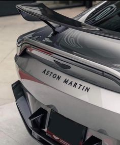 the back end of a silver sports car