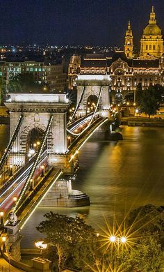 a bridge that is lit up at night