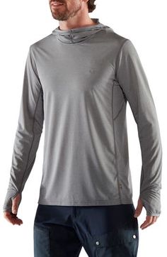 This quick-drying jersey hoodie is the perfect lightweight layer for your trek featuring stay-put thumbhole cuffed long sleeves. Fixed hood 100% polyester Hand wash, line dry Imported Winter Hiking Long Sleeve Top, Winter Long Sleeve Top For Hiking, Technical Midweight Long Sleeve Activewear, Moisture-wicking Midweight Long Sleeve Activewear, Go-dry Long Sleeve Sports Hoodie, Functional Long Sleeve Hoodie For Outdoor, Sports Long Sleeve Go-dry Hoodie, Sports Long Sleeve Hoodie With Go-dry Technology, Sporty Long Sleeve Tops For Hiking