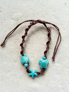 "Pair of turquoise polymer sea turtles and a starfish adorn this boho style of sliding, knotted cord 'friendship bracelet' or anklet. Diameter of opening is 12.5 \", easily slides over womens size 8.5-9 shoe for anklet. (Matching earring sold separately, https://www.etsy.com/listing/607942985/surf-buddy-earrings-turquoise-sea-turtle)" San Juan Capistrano, Sea Turtles, Anklet Bracelet, Macrame Jewelry, Sea Turtle, Friendship Bracelet, Turtles, Matching Earrings, Starfish