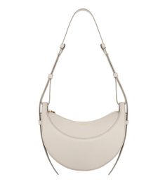 With its rounded shape, foam padding, and hand-stitching, the “Numéro Dix” is a nod to the equestrian codes of saddlery. Its half-moon design highlights juxtaposing curves. Chalk Texture, Body Craft, Cream Bags, Girly Accessories, Fashion People, French Brands, Friends Fashion, Moon Design, The Chic