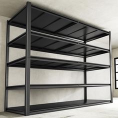 an empty metal shelving unit in a room