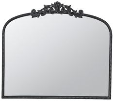 an ornate black frame mirror on a white background