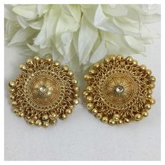 *PRODUCT DETAIL* *Material: Brass *Plating: 22K Antique Gold Plated *DIMENSIONS * *Earrings: Weight: 22 gm each, Length: 4 Inches, Width: 1.7 Inches *ABOUT PRODUCT* *Exclusive 22K Antique Gold Plated Stud Earrings in Antique Design. *Style Tip: Team It with Daily your Formal Indian Attire. *DISCLAIMER* *Product & color may slightly vary due to photographic lighting sources or your screen settings. Bollywood Style 22k Gold Jhumkas For Wedding, 22k Gold Jhumkas For Wedding And Navratri, Wedding Navratri Danglers With Intricate Design, Wedding Danglers For Navratri With Intricate Design, Wedding Danglers With Intricate Design For Navratri, Traditional 22k Gold Bridal Earrings For Festive Occasions, 22k Gold Chandbali Bridal Earrings With Latkans, 22k Gold Chandelier Earrings For Weddings And Festivals, 22k Gold Chandbali Wedding Danglers