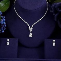 The Maria Jewelry Set Is A Pretty Bridal Jewelry Set With A Crystal Water Drop Extender And Matching Earring. Necklace Length: 18 Inches (42 Cm + 3 Cm Extender) Earring Length: 0.8 Inches (2 Cm) Available In Silver, Other Colors Deliver In A Week. #Bridaljewelry #Bridalearrings, #Czearrings #Silverjewelry #Earrings Wedding Jewelry For Bride, Bridal Necklace Set, Silver Wedding Jewelry, Diamond Jewelry Designs, Bridal Gold Jewellery, Bride Jewellery, Wedding Jewelry Sets, Bridal Jewelry Sets, Bridal Necklace