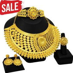 Your browser does not support our video. Make a statement with this stunning Gold Jewelry Set. This Bohemia style set features four pieces: necklace, earrings, ring and bracelet - all crafted from high-quality zinc alloy metal. Perfect for special occasions like weddings or other celebrations, this set will add sparkle and style to any look. Get ready to stand out in the crowd with this timelessly stylish Gold Jewelry Set! — Show off your inner diva with this gorgeous Gold Jewelry Set! Featuring a gorgeous bohemian round design, this luxurious set is perfect for any special occasion - weddings, parties or galas. Crafted with zinc alloy and metal, this set consists of a necklace, earrings, ring, and bracelet. With its eye-catching style and affordable price point, you can't go wrong with th Ethiopian Jewelry, Gold Jewelry Set, Ring And Bracelet, Custom Bridesmaid Dress, Big Necklace, Bohemia Style, Gold Jewelry Sets, Indian Necklace, Women's Jewelry Sets