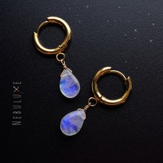 ✨ Step into a world of enchantment with our rainbow moonstone hoop earrings. Crafted to perfection, these hoops feature mesmerizing rainbow moonstones that shimmer with ethereal beauty. Known for their mystical properties and connection to intuition, rainbow moonstones add a touch of magic to any ensemble ✨ ⭒ Ball Studs:  4mm ball/15mm post * 925 Sterling Silver ⭒ Ball Stud pushbacks: butterfly backing encased in silicone ⭒ Hoops:  10mm/14mm * Stainless Steel ⭒ Hooks:  2'/5cm long * 925 Sterling Teardrop Hoop Earrings, 3rd Anniversary Gifts, 3rd Anniversary, Moonstone Crystal, Moonstone Earrings, June Birthstone, Moonstone Jewelry, Ethereal Beauty, Anniversary Gift For Her