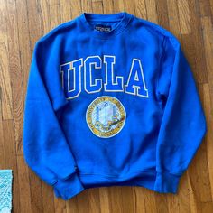 Vintage Jansport Ucla Pull-Over, Size Xs California, Los Angeles No Tears Rips Or Flaws Just Not “Brand New” Looking Because It’s Vintage Blue Casual Activewear With Graphic Print, Casual Blue Activewear With Graphic Print, Blue Stretch Activewear With Letter Print, Blue Sporty Activewear With Letter Print, Blue Fitted Tops For College, Blue Letter Print Activewear With Crew Neck, Blue Activewear With Letter Print And Crew Neck, Blue Crew Neck Activewear With Letter Print, Blue Letter Print Sportswear Tops