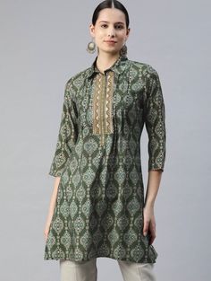 * Modal Shirt Collar Printed Ethnic Tunic Printed Kurti / Embroidered Short Kurti / Indian Tunic / Summer-Spring Evening Dress / Cotton Tunic Tops * Green and gold-toned printed tunic,has a shirt collar, three-quarter sleeves, embroidered detail *Fabric:- Modal  * Package Contains:-   Only One Kurti *Wash Care:- Hand Wash AVAILABLE IN 6 SIZES THEY ARE IN FOLLOWING MEASUREMENTS IN INCHES:- XS:- Bust-34/Waist-26/Length-36 S:- Bust-36/Waist-28/Length-36 M:- Bust-38/Waist-30/Length-36 L:- Bust-40/Wa Kurti Top, Ethnic Kurti, Kurtis For Women, Tunic Tops Summer, Women Tunic, Cotton Tunic Tops, Indian Tunic, Short Kurti, Gold Shirt