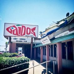 an image of the outside of a restaurant called gaudi's in san clement, california