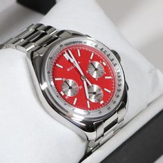 96K115 Red Automatic Watches With Round Dial, Red Automatic Watch With Round Dial, Red Automatic Watch For Gift, Classic Red Chronograph Analog Watch, Red Classic Analog Chronograph Watch, Classic Red Analog Chronograph Watch, Red Analog Watch For Formal Occasions, Red Automatic Watch Accessories For Gifts, Red Automatic Watch Accessories As Gift