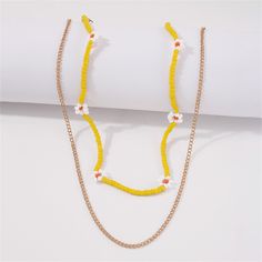 Colorful necklace set featuring vibrant howlite, mum flower charms and an 18k gold-plated finish. Includes 18k gold-plated chain and mum flower station necklace (two pieces total) Floral necklace: 15.55" L with 2.75" extender Chain necklace 2: 18.5" L with 2.75" extender Lobster claw clasp 18k gold-plated copper / howlite Flower Station, Mum Flower, Mums Flowers, Colorful Necklace, Station Necklace, Floral Necklace, Colourful Necklace, Flower Charm, Lobster Claw