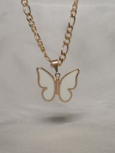 Entire necklace is 18k Gold Filled 18-inch chain White butterflies are a very positive omen of good luck, purity, rebirth, and great transformation. If a white butterfly finds you, consider it a really good sign <3 Butterfly Chain Necklaces, Butterfly Shaped Necklace With Chain As Gift, Dainty White Pendant Jewelry, White Charm Necklace With Pendant, White Pendant Charm Necklace With Chain, White Charm Necklace With Delicate Chain For Gift, White Delicate Chain Charm Necklace As A Gift, Dainty White Jewelry With Chain, White Pendant Jewelry With Adjustable Chain