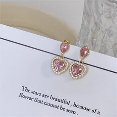 Description:Crystal Dangling Heart Earrings Specifications: Material: S925 silver, Copper, Cubic Zirconia, RhinestoneColors: PinkSize: 3 cm * 1.5 cmWeight: 6.8 g/pair "Add some sparkle to your style with these Crystal Dangling Heart Earrings! Perfect for a night out or a special occasion, these earrings will catch everyone's eye and make you stand out. 💎❤️" Blowout Sale, Enamel Bracelet, Different Outfits, Exquisite Jewelry, Pink Crystal, Heart Earrings, Heart Design, Crystal Earrings, Link Bracelets