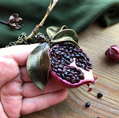 "This necklace already sold but I can make very similar (not 100% same) for your order. If you need longer chain please write it in comment to order) Statement juicy pomegranate pendant with leaves. Pomegranate seeds - natural garnet. skin and leaves - polymer clay. the bead at the top of the pendant is garnet. Garnet pomegranate ) Garnet - January birthstone Diameter of pomegranate 5cm (1.96\") Chain 48cm (19\")" Nature-inspired Birthstone Necklaces As Gifts, Nature-inspired Birthstone Necklaces For Gifts, Handmade Garnet Pendant Necklace, Red Nature-inspired Jewelry For Gifts, Garnet Natural Stones Jewelry For Gift, Garnet Pendant Necklace Gift, Garnet Pendant Necklace For Gifting, Garnet Pendant Necklace For Gift, Garnet Pendant Necklaces For Gift