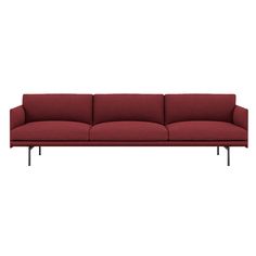 a red couch sitting on top of a white floor next to a black metal frame