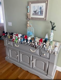 a toy chest with christmas decorations on top