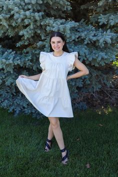 This dress could not be more perfect for summer. We love a neutral dress around here that pairs with absolutely everything! You would not believe the quality of this dress. I wish you could reach through the screen and feel it right now. Just take my word for it. Unreal ruffle sleeves with the cutest tiers AND pockets. Running true to size. Malorie is 5'6" and wearing a size medium. Neutral Dress, Head In The Clouds, Trend Report, In The Clouds, Ruffle Sleeves, Feel It, 50's Dress, The Clouds, Love A