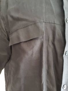 This is a vintage, Bruno, black, short sleeved, washable linen shirt with a collar and buttons down the front. The measurements are: Armpits: 24.5 inches across Length from back of the neck: just shy of 30 inches Don't forget to stop in at my other Etsy shop... http://www.etsy.com/shop/xtdesigns If you have a wish list or are looking for something specific, please ask. I may have exactly what you are looking for. As always please convo me with any questions or concerns regarding this item or wit Vintage Black Shirt For Work, Black Linen Button Shirt, Black Collared Linen Shirt, Black Linen Collared Shirt, Vintage Black Workwear Shirt, Black Cotton Button-up Short Sleeve Shirt, Washed Black Cotton Shirt With Button Closure, Black Soft-washed Short Sleeve Shirt, Vintage Black Shirt With Button Closure