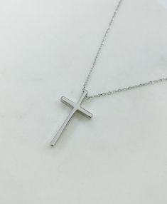 "Silver cross necklace, cross necklace, religious necklace cross, religious gift, simple cross necklace, silver necklace, religious gifts women Simple and elegant shiny silver plated cross necklace. D E T A I L S: * Silver plated cross pendant charm 13mm x 23mm * Silver plated chain *Lobster clasp closure *Shown at 18\" length SHIPPING: *Free domestic shipping on all orders PACKAGING: *All pieces come beautifully packaged, perfect for gift giving. Find more to ❤️ here: http://etsy.com/shop/theje Everyday Minimalist Cross Pendant Necklace, Minimalist Daily Wear Cross Pendant Necklace, Minimalist Everyday Cross Necklace, Simple Everyday Cross Pendant Necklace, Simple Everyday Cross Necklace, Simple Sterling Silver Cross Pendant Necklace, Simple Cross Necklace Silver, Simple Cross Necklace, Orders Packaging