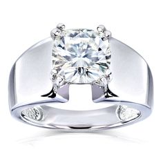 a white gold ring with a square cut diamond