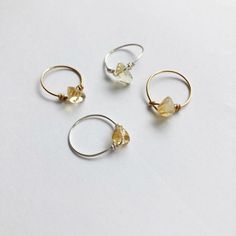 * Free Worldwide Shipping on orders totalling £40 or more with code WORLD40 at checkout ** Handmade by Midnight Deer in Brighton UK * Simple Citrine Stone Rings - perfect worn alone for a minimal look or stacked with other designs Available in silver plated brass or gold tone brassCitrine: Associated with attracting Prosperity, Manifesting whatever you hope, Calming Stress. Yellow to Amber Tones, clear to cloudyOur ring sizes are approximately: Size S (UK size i) Size SM (UK size k) Size M (UK s Elegant Citrine Crystal Open Ring, Minimalist Citrine Gemstone Ring, Gold Brass Crystal Ring With Gemstone, Gold Citrine Crystal Open Ring, Brass Crystal Gemstone Open Ring, Obsidian Ring, Brighton Uk, Peridot Stone, Rose Quartz Ring