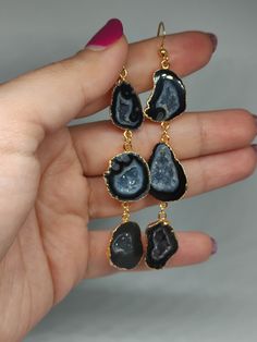 Introducing our exquisite Raw Mexican Geode Dangle Earrings! Handpicked from ancient geode formations, each earring showcases the vibrant colors and intricate crystal formations unique to Mexican geodes. Wear a piece of Mexico's geological wonder as a stunning accessory.  🔸Nickel-free 🔸10/12 mm stone size 🔸Color may vary according to lighting 🔸Gold filled We offer  🔸Fast shipping  🔸Free shipping eligible orders 🔸Polishing cloth  🔸Free item on orders of 100€ 🔸Gift box 🎁 🔸Great customer Gift Long Drop Chandelier Earrings With Natural Stones, Agate Drop Earrings As A Gift, Dangle Gemstone Chandelier Earrings As Gift, Long Drop Chandelier Earrings With Natural Stones For Gift, Natural Stone Drop Earrings For Gift, Crystal Gemstone Long Drop Earrings For Gifts, Gift Crystal Long Drop Earrings With Gemstone, Natural Stones Drop Earrings For Jewelry Making, Agate Drop Jewelry With Natural Stones