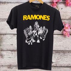 Vintage Ramones Tee Punk Rock, Ramones Black T - Shirt, Black Music T - Shirt, Vintage T - Shirt, Gifts for best friends, Tee, Tour T-Shirt WELCOME TO OUR STORE  LOOMINGDUO  --------- PRODUCT ---------- - Cotton graphic T-shirt, custom t shirts, custom t shirt printing - Lightweight, extremely comfortable and durable 100% Cotton - High Quality - Size: S, M, L, XL, 2XL, 3XL, 4XL, 5XL We have a size chart in the picture, please refer to and choose the right product. ------SHIPPING-------- Every or Rock Style T-shirt With Band Logo For Music Festivals, Summer Rock T-shirt With Band Logo, Band Merch Shirt With Graphic Print For Concerts, Band Merch Graphic Tops For Concerts, Band Merch Tops With Graphic Design For Concerts, Band Merch Graphic Design Tops For Concert, Grunge Graphic Print Shirt For Concert, Punk Style Graphic Print Shirt For Concert, Punk Style Graphic Shirt For Concerts