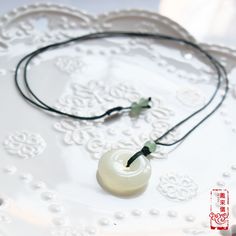 Decorated with natural jade stone charms, this collection of necklaces expresses Chinese typical themes under the background of jade culture. We select a series of carved jade stone pendants: lotus, baby lock, bamboo, and peace buckle. Jade is a symbol of the virtue of gentlemen and highly prized for its strength and beauty. It will bring people good fortune and soft elegance. The paired necklace is adjustable with braided craft, made of top-quality jade cords. The overall design embodies implic Chinese Jade Necklace, Chinese Necklace, Ancient Necklace, Fen Shui, Runway Jewelry, Accesories Jewelry, 5 Elements, Chinese Jade, Carved Jade