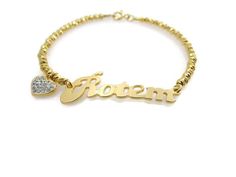 "Name bracelet. Lock gold bracelet. Gold heart bracelet. Beaded name bracelet. Personalized bracelet. Gold plated brass bracelet. Gift ideas 🌟 Bracelet info: The chain and beads are made of brass plated with 18k gold. The name pendant is made of brass plated with 18k gold decorated with a small heart. Lengths available - 6.5\", 7\", 7.5\". If you need the length to be bigger or smaller, chose the \"different length\" option and write me the size you want. 🌟 Shipping Info: All bracelets are pac Gold Heart-shaped Name Bracelet With Letter Beads, Gold Nameplate Bracelets For Valentine's Day, Gold Name Bracelet With Heart Beads, Anniversary Gold Bracelets With Letter Beads, Gold Heart-shaped Name Bracelet For Anniversary, Gold Heart Name Bracelet For Anniversary, Gold Heart Beads Name Bracelet, Gold Heart Name Bracelet With Heart Beads, Valentine's Day Gold Name Bracelet