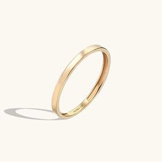 The Basic Band Ring has a plain design which makes the piece one of the most elegant piece. If you are in an extreme love with minimalist jewelry, the Basic Band Ring is to be your Alpha. - Made in 14k solid gold- Band Width: 1.62 mm / 0,06 inches- Thickness: 1.13 mm / 0,04 inches - This product comes with iconic Norm Luxury Jewelry Brands, Solid Gold Band, Gold Ring Designs, The Alpha, Gold Piece, Plain Design, Gold Band, Minimalist Style, Minimalist Jewelry