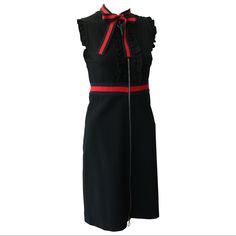 Experience The Epitome Of Elegance With The Gucci Black Bow Knot Dress, A True Masterpiece In Fashion. The Dress Is Exquisitely Adorned With Knitted Web Trim, Gracefully Accentuating The Waistband And Neckline, Culminating In A Charming Decorative Bow. Crafted From Luxurious Black Compact Viscose Jersey, This Dress Features Captivating Blue And Red Knitted Web Details, Adding A Touch Of Gucci's Signature Style. The Front Placket And Sleeves Boast Delicate Ruffle Detailing, Elevating The Dress To New Heights Of Sophistication. Designed With Both Style And Convenience In Mind, The Dress Is Equipped With A Front Zip For Easy Wear. Originally Priced At $1800, This Authentic Gucci Dress Is An I Chic Sleeveless Gucci Dress, Chic Gucci Sleeveless Dress, Gucci Knee-length Cocktail Dress, Gucci Sleeveless Formal Dress, Sleeveless Gucci Cocktail Dress, Sleeveless Formal Gucci Dress, Gucci Sleeveless Cocktail Dress, Designer Black Sleeveless Dress, Chic Knee-length Gucci Dresses