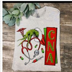 Cute Design ! Custom Made And Will Ship Within A Few Days! On Gildan Unisex Short Sleeve Check Out My Page For More Designs Gardening Shirts Funny, Bleach Dye Shirts, Grinch Shirt, Grinch Shirts, Certified Nursing Assistant, Nurse Christmas, White Shirts Women, Nursing Assistant, Gardening Shirts