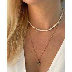 Delicate high luster mother of pearl heishi beads with 14kt gold filled accents. Individually selected high quality freshwater pearls make the necklace truly special and one of a kind. The delicate and minimalist design goes well with both casual and sophisticated looks. Total length of the necklace: 15 inches plus 1 inch chain extender. Follow the shop on INSTAGRAM: @soellejewelry Tag soelle jewelry on social media: #soellejewelry Packed with care and ready to ship! Handmade with love ♥ White Single Strand Pearl Necklace With 14k Gold Filled, White Single Strand Pearl Necklace In 14k Gold, White Mother Of Pearl Necklace With Gemstone Beads, Gold Shell Necklace With Gemstone Beads As Gift, Adjustable White Pearl Necklace With 14k Gold Filled, Adjustable White Pearl Necklace In 14k Gold Filled, Delicate Choker, Summer Necklace, Chain Extenders