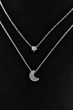 This lovely necklace makes a beautiful, lasting gift. I make this using 925 sterling silver chain and spring clasp. The crescent moon charm is a metal alloy with shiny silver finish and measures approximately 1/2 inch tall. It moves freely along the chain. Comes in a gift box, perfect for gift-giving. This piece looks great when paired with a star necklace. See 5th photo for both necklaces together. Listing is for moon necklace only but star necklace can be purchased here: www.etsy.com/listing/2 Dainty Silver Moon Charm Necklaces, Dainty Silver Moon Charm Necklace, Silver Moon Charm Necklace For Gift, Silver Crescent Sterling Silver Charm Necklace, Silver Moon-shaped Clavicle Chain Charm Necklace, Silver Half Moon Charm Necklaces, Silver Moon Charm Necklace With Adjustable Chain, Silver Crescent Moon Phase Charm Necklace, Silver Half Moon Charm Necklace