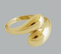 This is a contemporary gold ring with an open design. It features two smooth, polished ends, one of which is rounded like a sphere, while the other is more elongated and curved. The minimalistic yet bold design gives the ring a modern and artistic feel, making it a striking statement piece. The shiny gold finish adds elegance, and the open structure allows for some adjustability in size. Ideal for those who appreciate unique, sculptural jewelry. Luxury Crescent-shaped Yellow Gold Ring, Modern Gold Curved Rings, Modern Gold Rings With Curved Design, Modern Curved Gold Rings, Modern Twist Open Dome Ring For Formal Occasions, Modern Twist Open Design Dome Ring For Formal Occasions, Modern Twist Formal Open Dome Ring, Sculptural Jewelry, Etsy Gold Ring