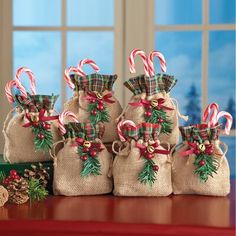 christmas candy canes in burlock bags on a table