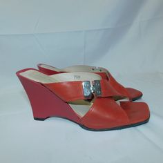 Rare Find...Via Spiga Made In Italy Leather Red Wedge Heel & Cinnamon Reddish Orange Color Straps Sandal. Cool Hinge Buckle On The Top Strap. Square Toe. Worn 1 Time But No Signs Of Wear To Soles. May Have Been Worn Inside. Size 7.5 Retail $350.00 Slip-on Wedge Sandals With Red Sole, Red Leather Wedge Sandals For Summer, Red Leather Wedge Sandals, Elegant Red Slip-on Sandals, Red Wedge Heel Sandals With Heel Loop, Elegant Red Wedge Sandals For Summer, Leather Wedge Sandals With Red Sole, Spring Leather Wedge Sandals With Red Sole, Modern Red Heels With Removable Insole