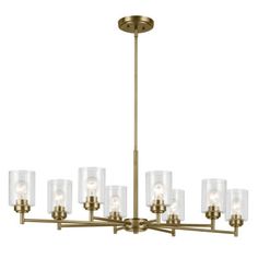 a brass chandelier with clear glass shades